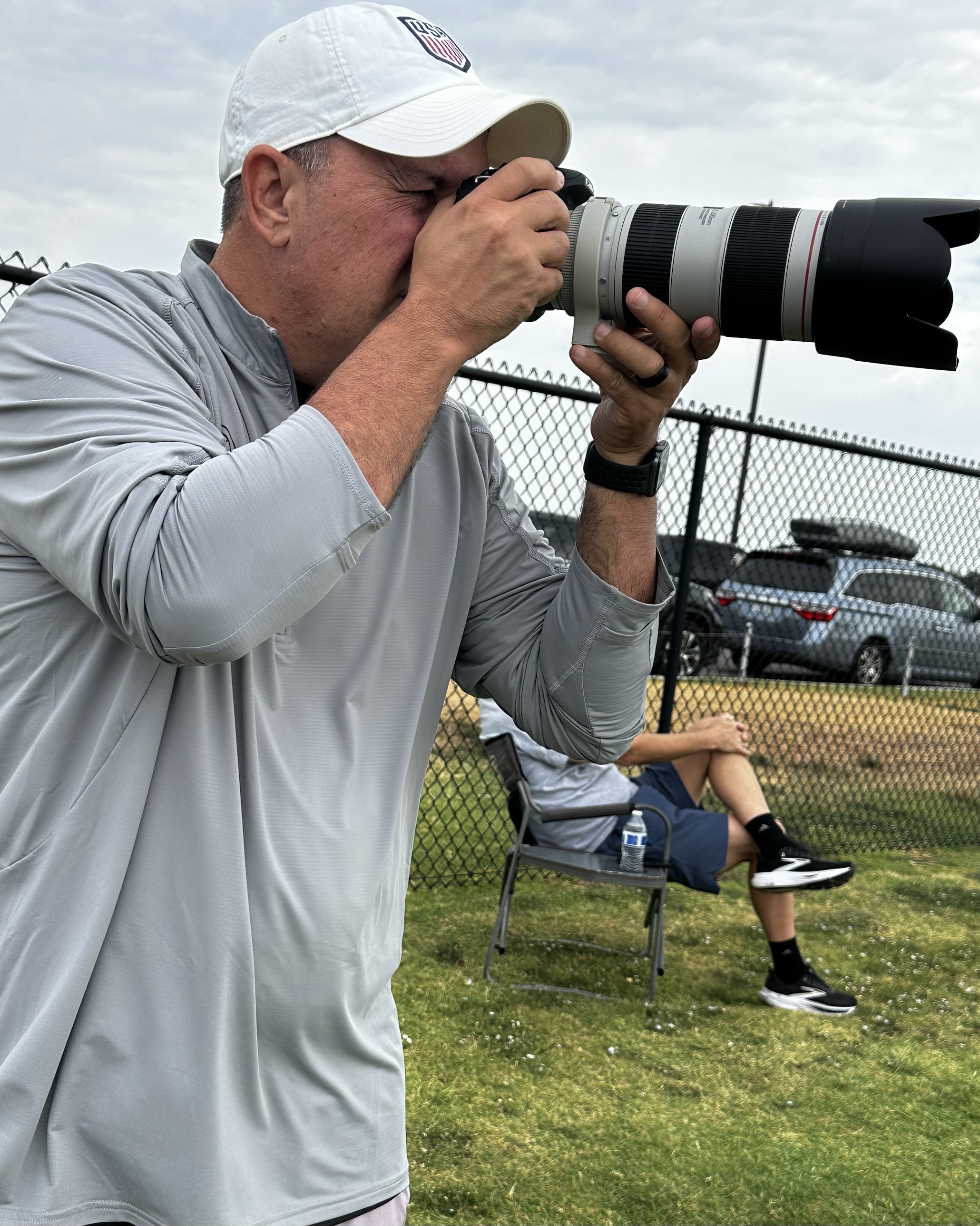 Phil, Perky Pics photographer, shooting a youth soccer match on the sideline